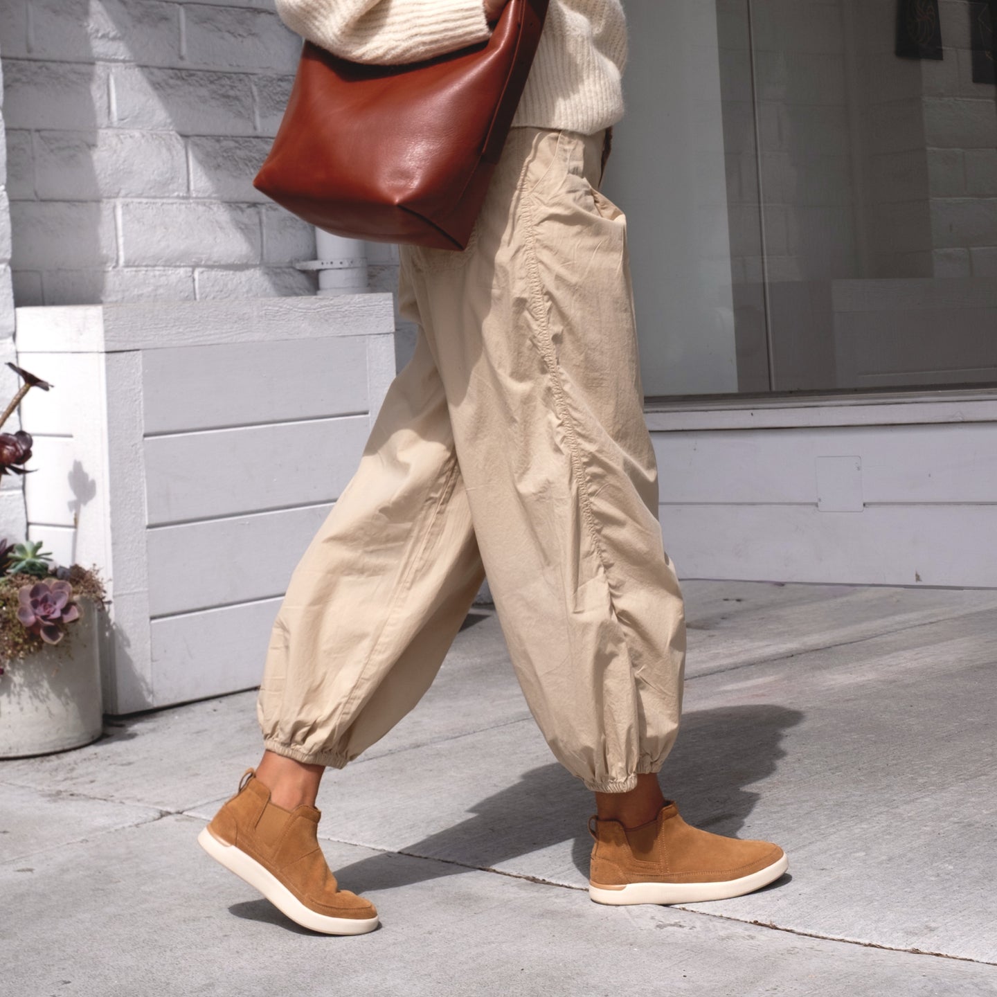 Side view of Neptune Athena women's footwear in natural suede facing right, showcasing extra cushioning and arch support.