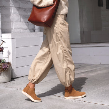 Side view of Neptune Athena women's footwear in natural suede facing right, showcasing extra cushioning and arch support.