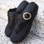 Vista Gabriella black slip-on sandals facing forward, showing buckle detail, arch support, and cushioned footbed close-up.