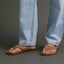 Ojai Classic tan sandals on men's feet facing forward, featuring comfort cushioning and anatomical arch support.