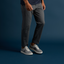 Triton men's grey sneaker facing right, showing side and top with cushioning and arch support, beach-inspired comfort