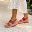 Water Vista Higher women's red platform sandals facing right, showing front and side, beach-inspired and comfort-focused design.