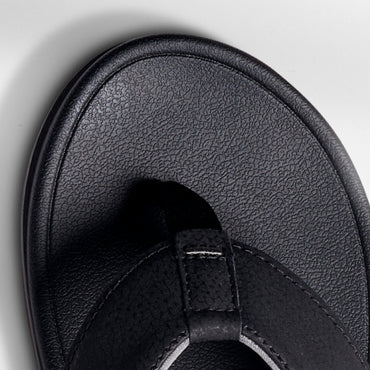 Close-up of the front toe area of the Phantom Bonzer men's black sandal, designed for beach comfort and durability.