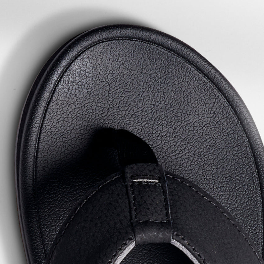 Close-up of the front toe area of the Phantom Bonzer men's black sandal, designed for beach comfort and durability.