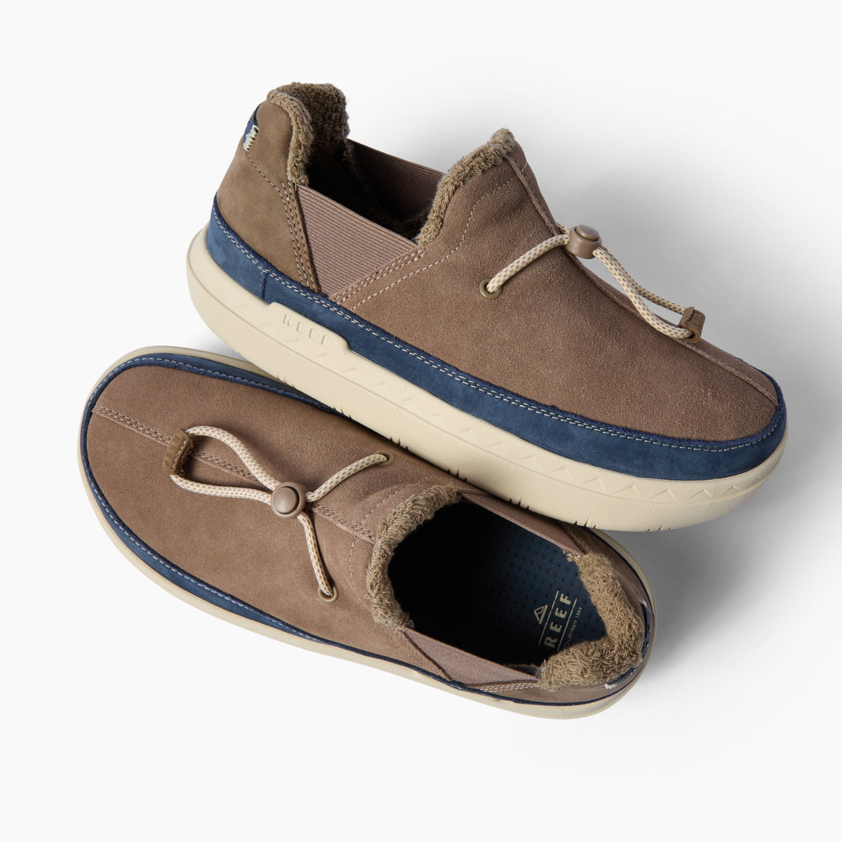 Rambler brown suede shoes facing opposite directions with cozy terrycloth lining and cushioned EVA soles