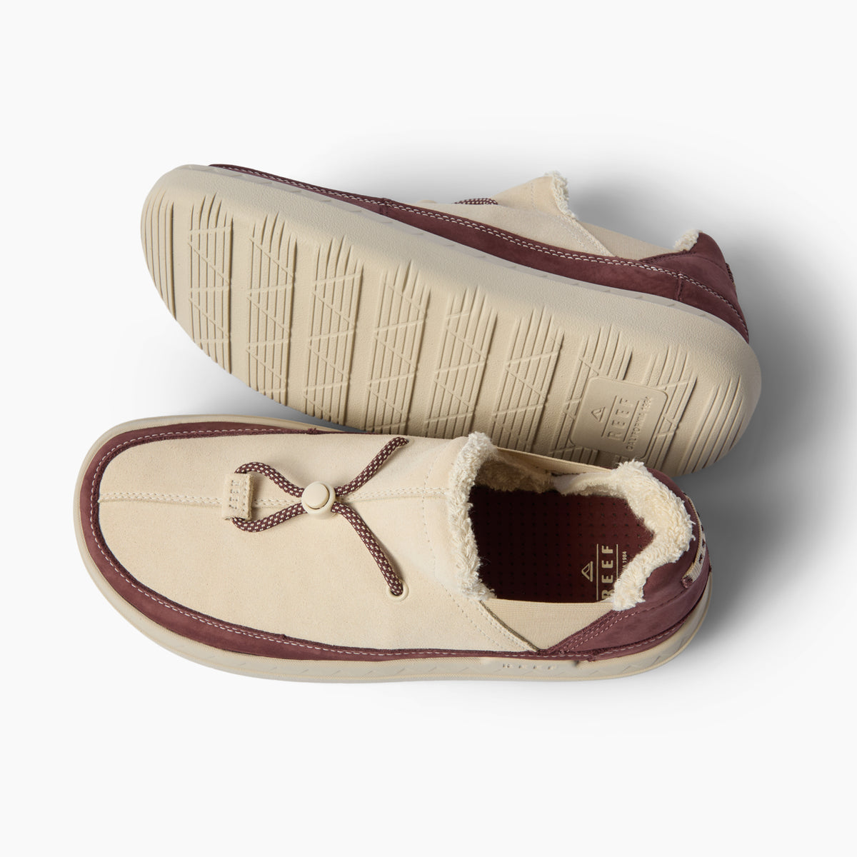 Rambler men's shoes shown facing left with suede uppers, cozy terrycloth lining, and cushioned EVA outsole