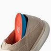 Neptune HT shoe facing left with a close up of the tongue collar and textured upper