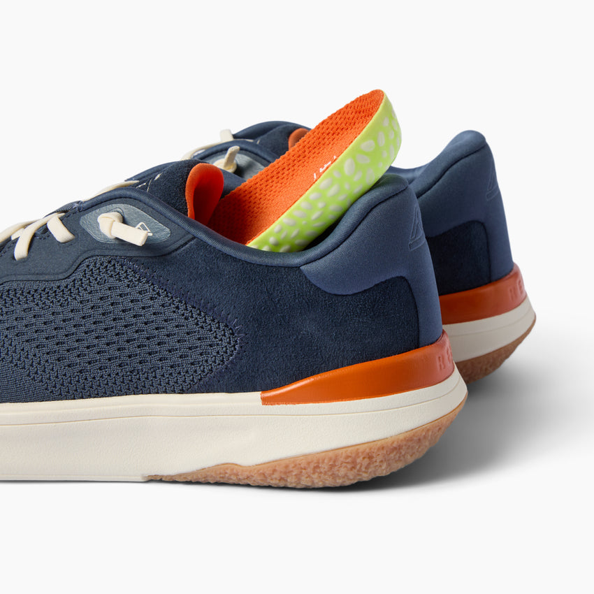 Shoreline Del Mar navy sneakers facing left, close up of the cushioned heel and textured outsole