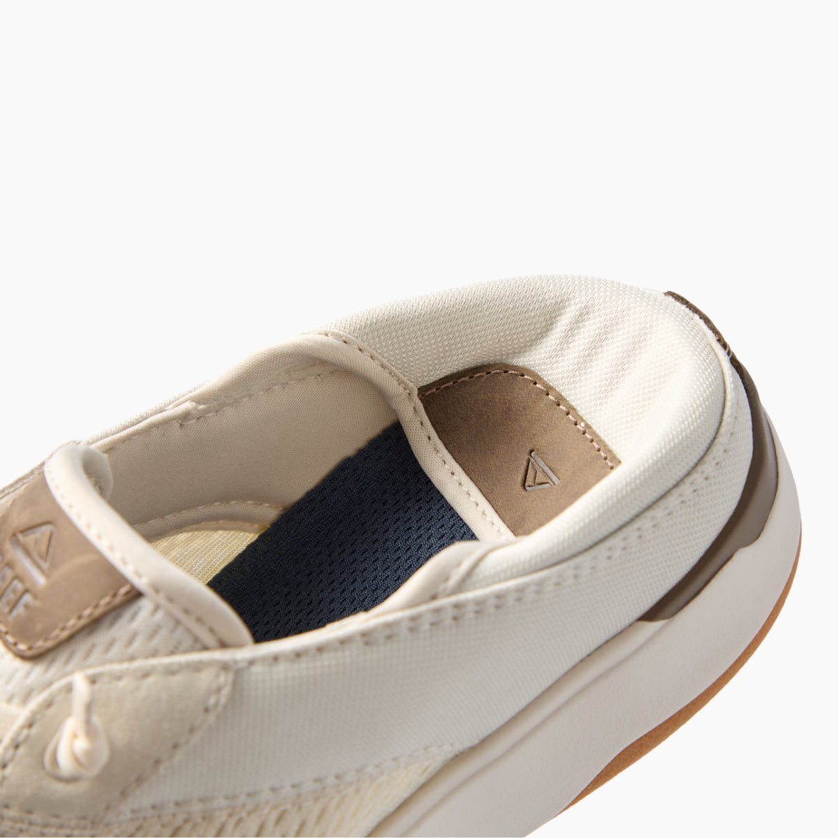Laguna shoe facing left, close-up of its breathable upper and cushioned heel