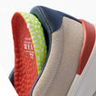 Close-up of a left-facing shoe interior showing layered cushioning and a textured footbed