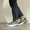 Del Mar Slip On blue slip on sneakers facing left with cushioned support