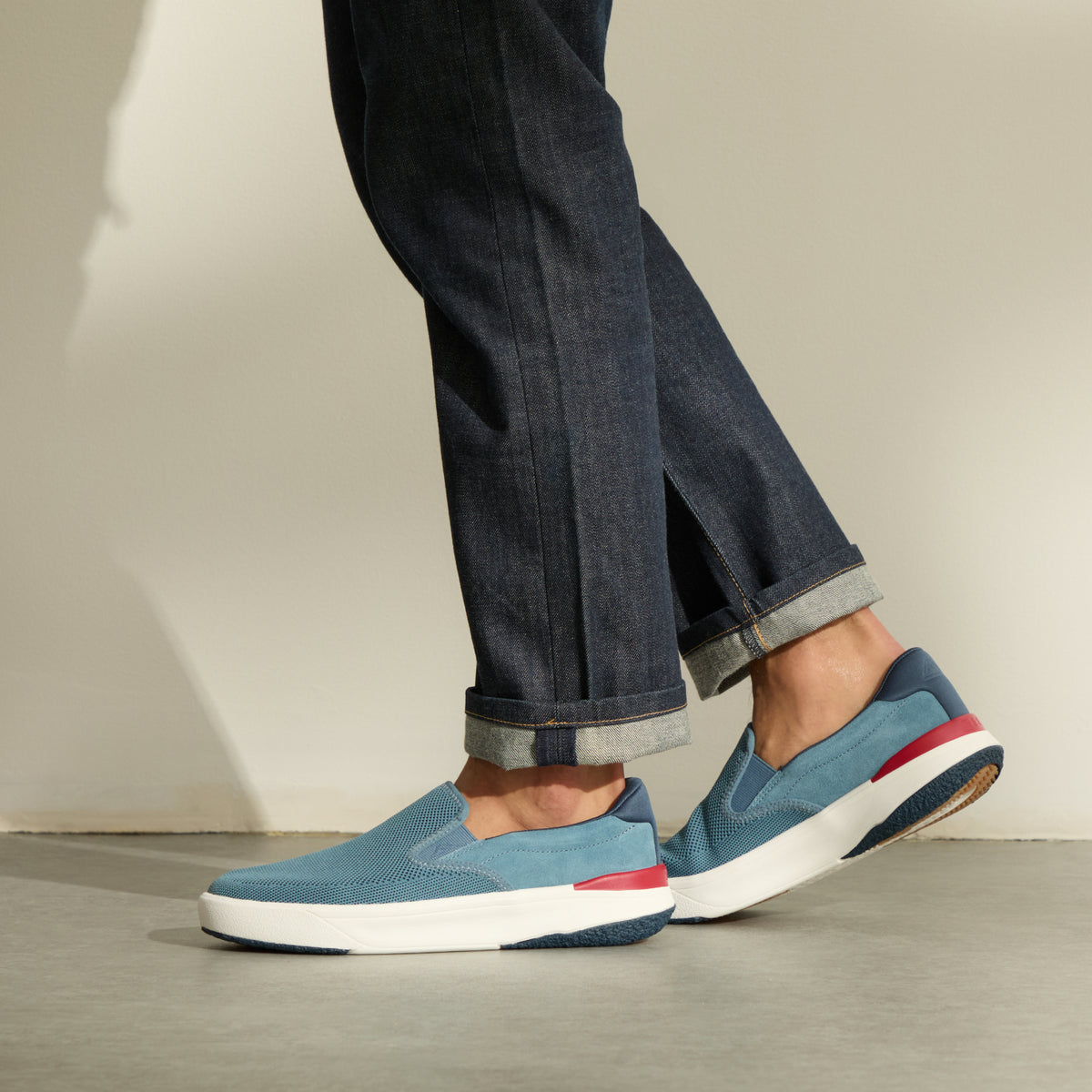 Del Mar Slip On blue slip on sneakers facing left with cushioned support