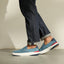Del Mar Slip On blue slip on sneakers facing left with cushioned support