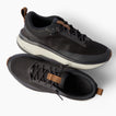 Zuma black sneakers one facing right and one facing left with breathable knit uppers and cushioned comfort