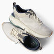 Zuma cream and gray sneakers viewed from above one facing right and one facing lower left