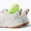 Zuma white knit sneakers, side and heel view facing left, with cushioned soles and pull tabs