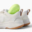 Zuma white knit sneakers, side and heel view facing left, with cushioned soles and pull tabs