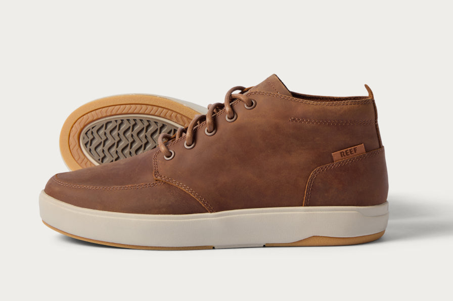 Brown REEF high top shoes facing left in side view, with cushioned soles and textured tread visible on the overlapping shoe