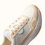 Venice Sonny x Jenny sneaker close-up showing front and side views with textured knit and soft-rebound cushioning