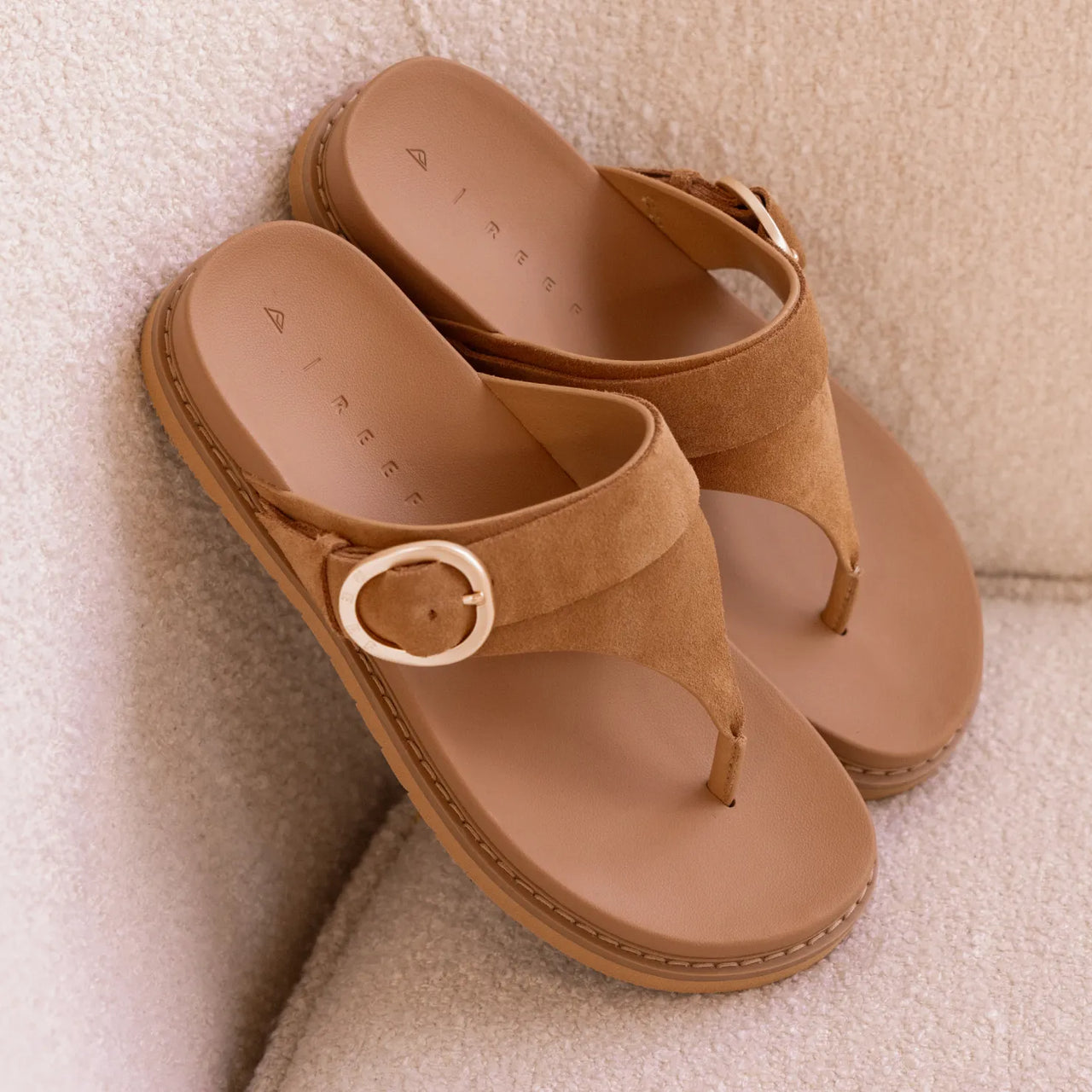 Vista Gabriella suede sandals facing up with buckle detail, arch support, and soft cushioning for beach comfort.