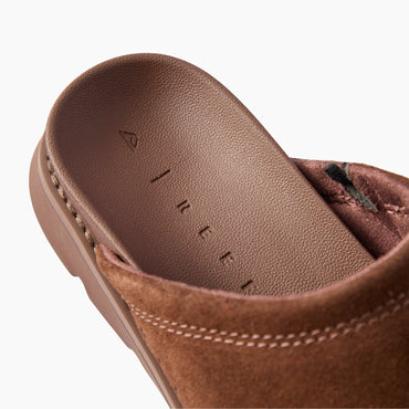 Vista Luxe Mariana brown suede clog close up of cushioned footbed and heel facing upper left