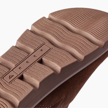 Vista Luxe Mariana brown suede clog outsole facing the camera in close up with textured tread for comfortable everyday wear