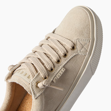 Lay Day Dawn sneaker facing upper right, close-up of the laces and suede upper with a cushioned sole