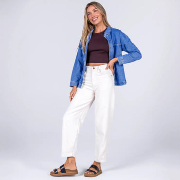 Woman standing wearing black Vista Hi 2 sandals facing forward, showcasing lightweight, arch support, and beach-inspired comfort.