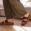 Vista Hi 2 women's sandals facing right, brown braided and smooth straps, lightweight with enhanced arch support, close-up on feet