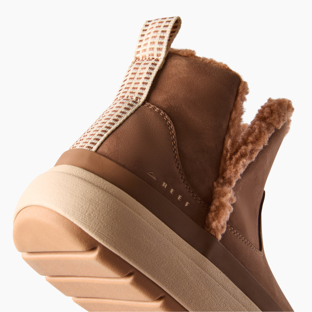Weekend Autumn brown REEF boot facing left in close up showing the side shaft heel and cushioned sole