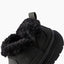 Weekend Olivia black boot with toe facing left close up of plush faux fur collar and grippy lightweight sole