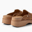 Vista Skye platform clogs in leopard print, rear three-quarter view facing away, showing open heels and cushioned footbeds