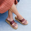Vista Hi 2 burgundy platform sandals facing right on feet with comfortable arch support