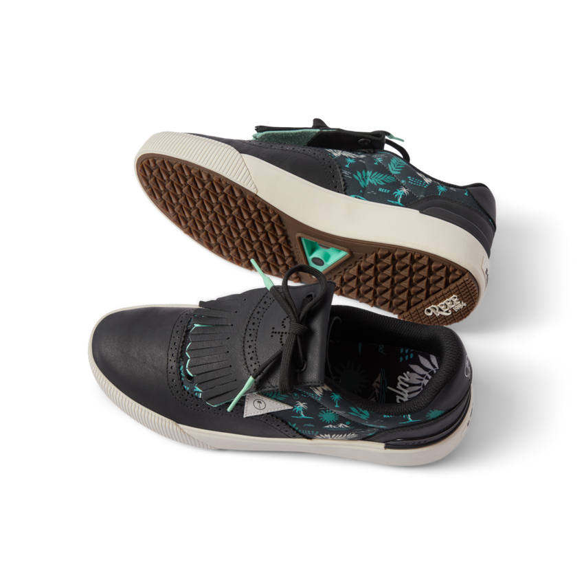 Top and side view of black Onshore Pebble X Palm men's sneaker with teal palm pattern, facing left, showing sole and upper design