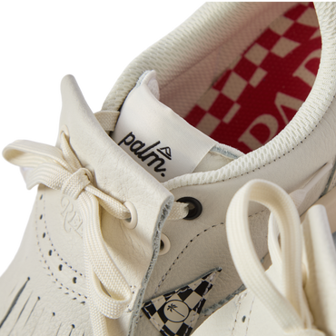 Close-up of the front and top of the Onshore Pebble X Palm men's shoe facing forward, showing comfort details and surf-inspired design.