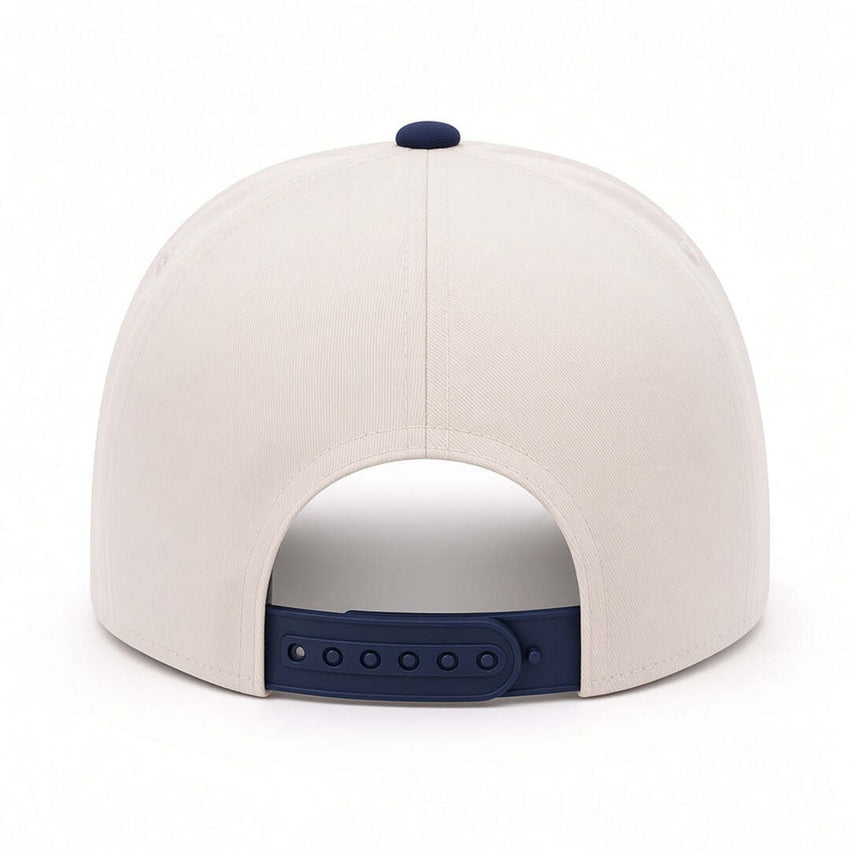 REEF x Palm Snapback hat viewed from the back, showing adjustable navy snap closure and cream crown