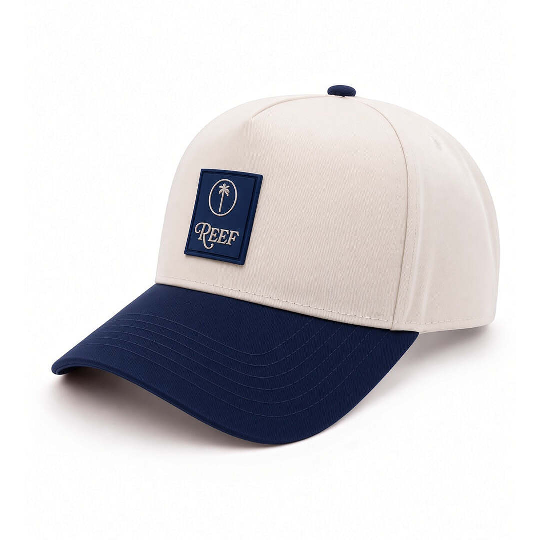 REEF x Palm Snapback front-facing cream and navy golf hat with curved brim and palm logo