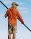 Man facing right wearing Men's Palmera Boardshort - Floral Camo with camo face covering and orange hoodie, holding black paddle outdoors