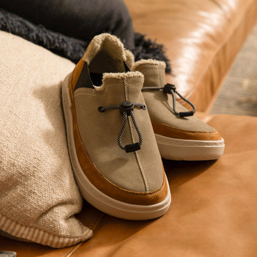Rambler shoe facing right, close-up of front and side with water-friendly materials and cushioned sole for comfort.