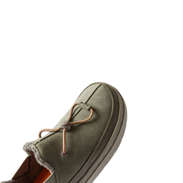 Rambler shoe facing left, close-up on front with soft suede upper, elastic laces, and cushioned sole for all-day comfort.