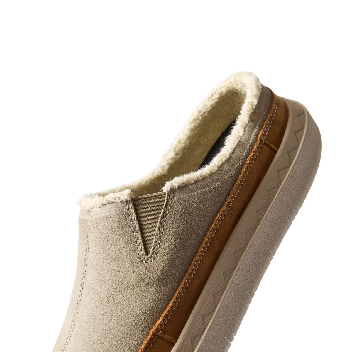 Rambler Mule close-up side view facing lower left with plush terry lining and cushioned outsole