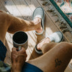 Rambler Kicker gray mules facing upward, worn indoors for cushioned everyday comfort