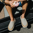Rambler Mule cream leather slip on shoes facing forward with plush cushioning