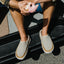 Rambler Mule cream leather slip on shoes facing forward with plush cushioning