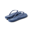 Seaside Twist women's indigo flip flops facing right, showing lightweight, cushioned footbed and braided straps.