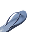 Seaside Twist women's flip flop facing right with braided straps, cushioned footbed, and water-friendly design.