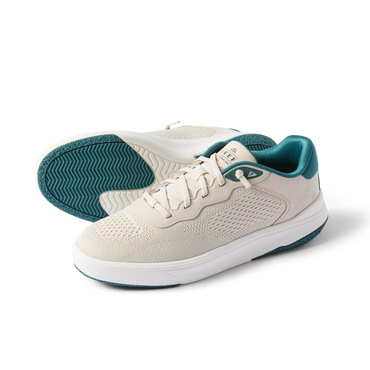 Pair of Shoreline Del Mar sneakers in off-white with teal accents, right shoe facing left showing side and sole details.