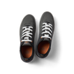 Top view of black Neso men's sneakers with white laces, featuring breathable mesh, arch support, and soft-rebound cushioning.