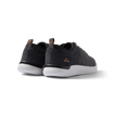 Neso men's black sneakers facing backward, showing heel with anatomical arch support and soft cushioning.