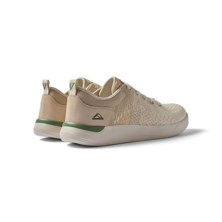 Neso men's shoes facing left rear showing heel and side with soft-rebound cushioning and anatomical arch support.
